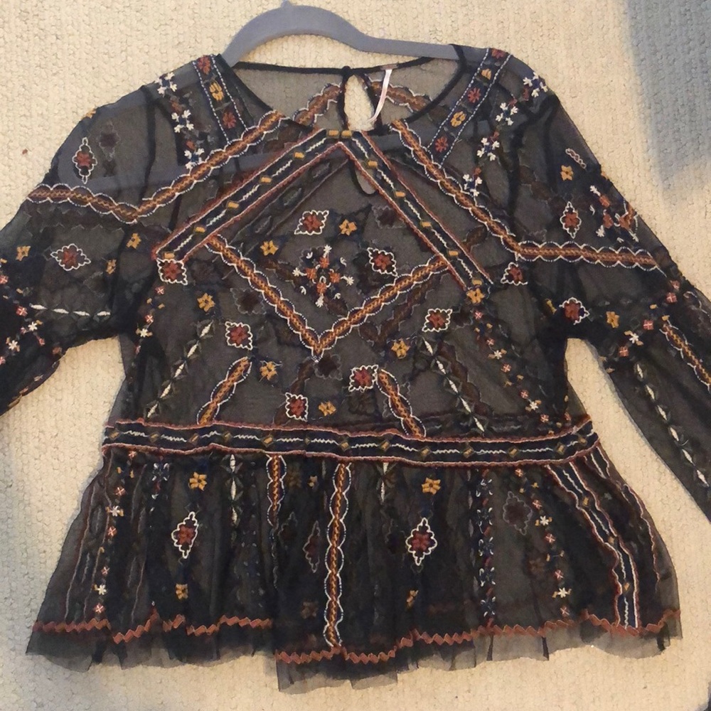 Like new Free people size M black sheer top with puffed long sleeves